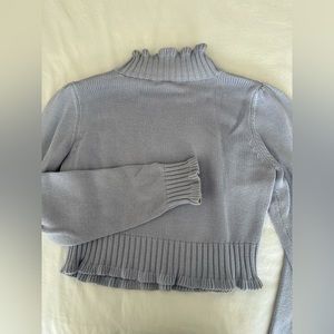 Purple 525 frilled turtle neck sweater